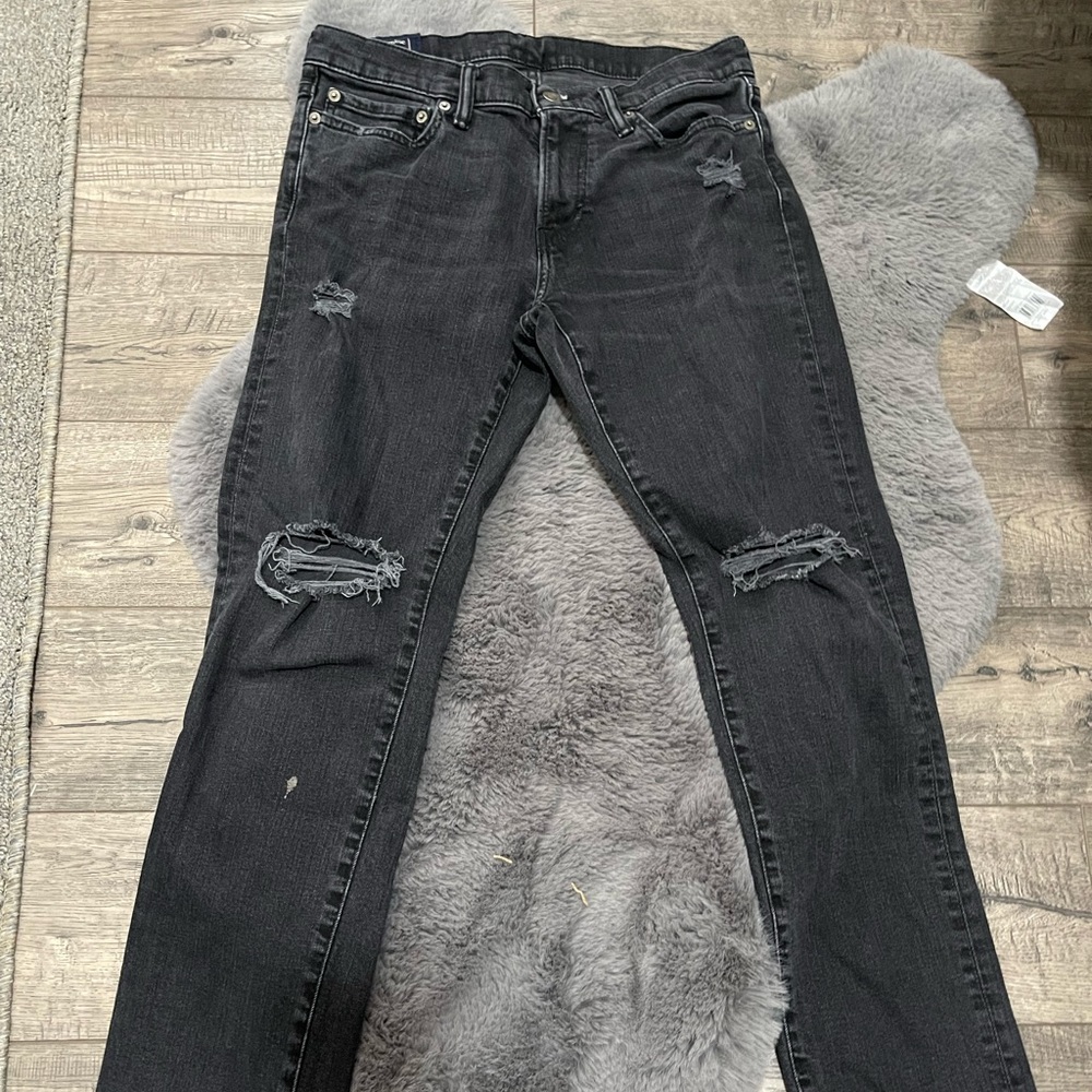 black ripped jeans